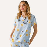 Three Pocket Smiley Face Daisy Print Scrub Top
